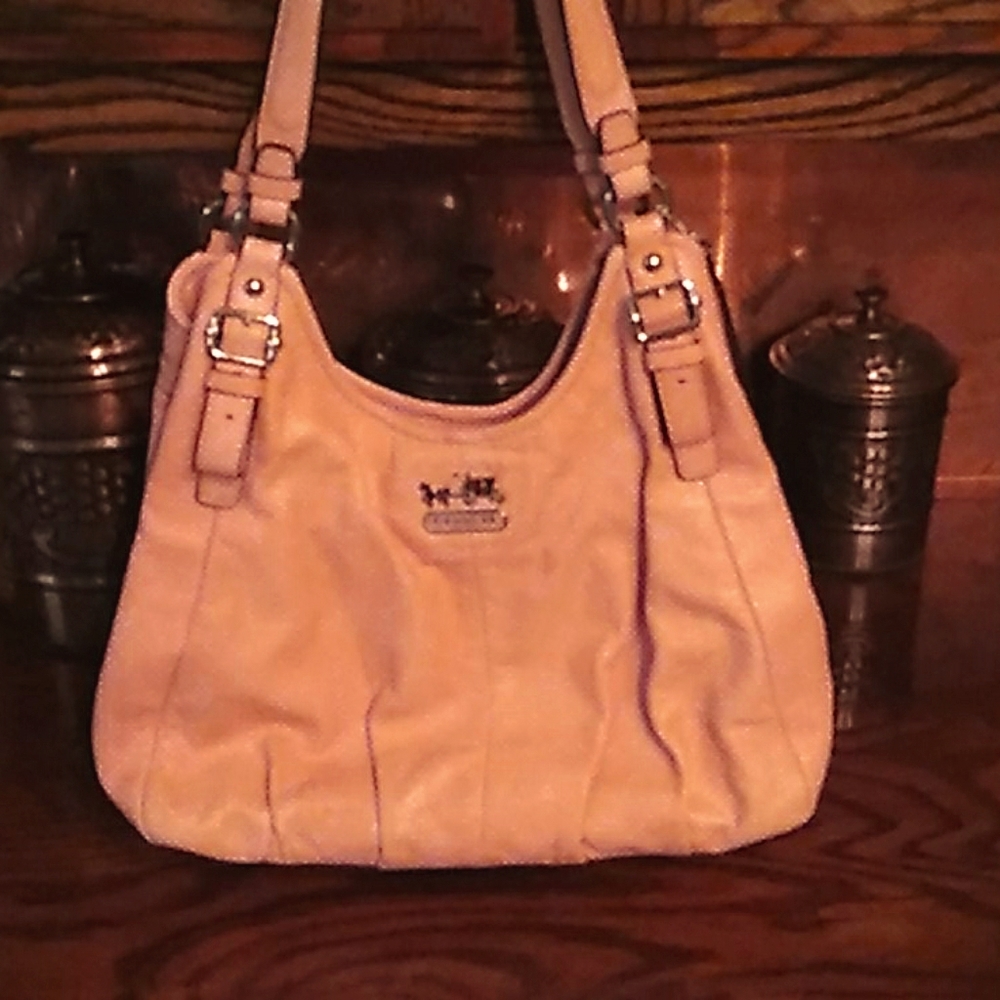 - Coach purse or handbag this bag is peach c…